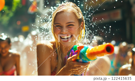 A group of people joyfully splash water on each other during Songkran Day. The concept of festivity, cultural tradition, and the spirit of renewal. Generative AI. 122415635