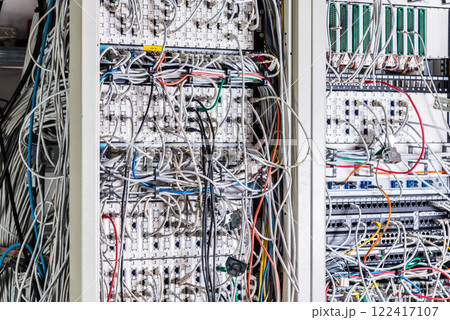 server room rack with tangled network cables creating messy unti server room rack with tangled network cables creating messy unti 122417107