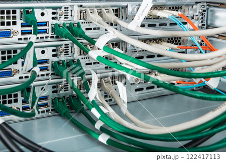 Fiber Optic cables connected to optic ports, network cables conn 122417113