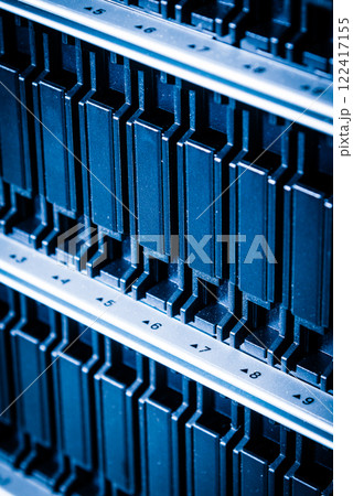 cluster of data storage SSD hard drives inside server rack 122417155