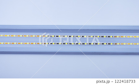 two LED strips in a metal case on a white background 122418733