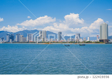 The sea promenade of the city. Nha Trang is a resort city in Vietnam. It's a sunny day. The sea promenade of the city. Nha Trang is a resort city in Vietnam. It's a sunny day. 122419356