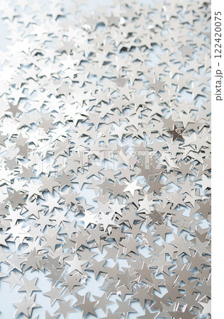 Stars shaped confetti as festive background. Stars shaped confetti as festive background. 122420075