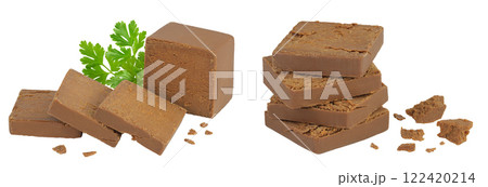 Brown cheese. Norwegian brunost isolated on white background with full depth of field 122420214