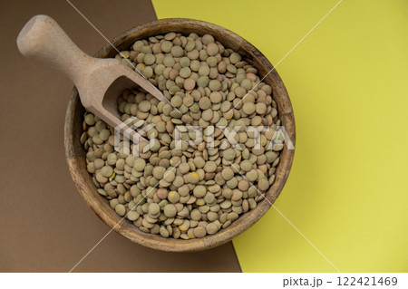 Raw green lentil Gluten free cereals. Health gut benefits. Concept of alternative whole spelt grain ingredient. Vegetarian diet recipes. Plant-based lifestyle. Copy space Protein rich 122421469