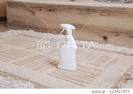Mock-up Plastic Spray Bottle for Chemical and Cleaning Solutions. Cleaning Stain on Carpet. Cleaning Removing Old Stains from Carpet. 122421973