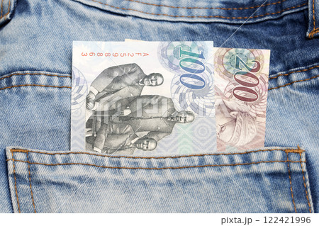 Botswana pula in the pocket of blue jeans 122421996