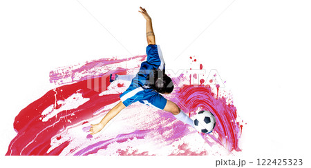 Modern art collage. Male soccer goalkeeper dressed in blue jersey, diving to block ball, stretching arms wide, against intense red and pink brushstroke background. Modern art collage. Male soccer goalkeeper dressed in blue jersey, diving to block ball, stretching arms wide, against intense red and pink brushstroke background. 122425323