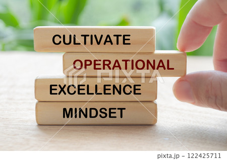 Cultivate operational excellence mindset text on wooden blocks. Culture of continuous improvement concept 122425711