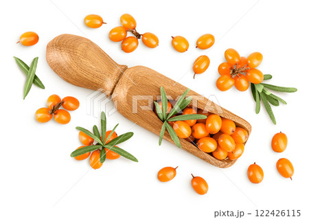Sea buckthorn in wooden scoop. Fresh ripe berry with leaves isolated on white background. Top view. Flat lay Sea buckthorn in wooden scoop. Fresh ripe berry with leaves isolated on white background. Top view. Flat lay 122426115