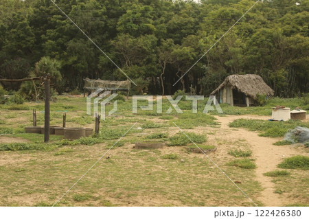 Fishermen Hut in a beach 122426380