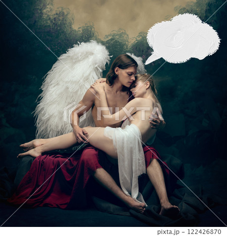Winged male angel embraces tender woman against vintage background with abstract white speech bubble. Sense of tenderness and protection Winged male angel embraces tender woman against vintage background with abstract white speech bubble. Sense of tenderness and protection 122426870