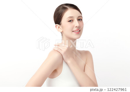 Beautiful young woman with clean fresh skin on white background, Face care, Facial treatment, Cosmetology, beauty and spa, women portrait. Beautiful young woman with clean fresh skin on white background, Face care, Facial treatment, Cosmetology, beauty and spa, women portrait. 122427961