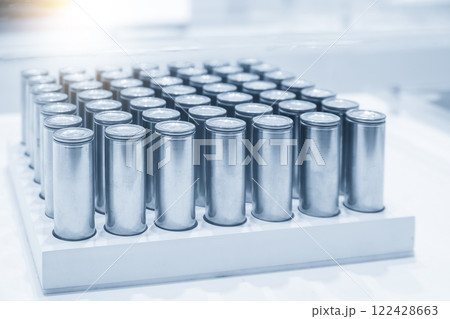 The group of electric vehicle car battery pack in the light blue scene with lighting effect. 122428663