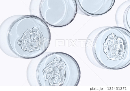 Skin serum or face wash gel in a Petri dish. For cosmetic procedures. White background 122431271