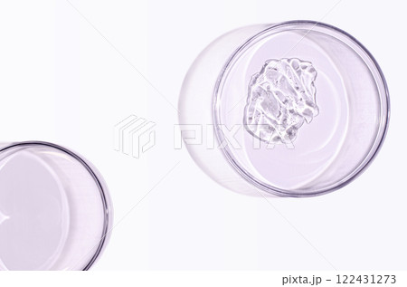 Skin serum or face wash gel in a Petri dish. For cosmetic procedures. Skin serum or face wash gel in a Petri dish. For cosmetic procedures. 122431273