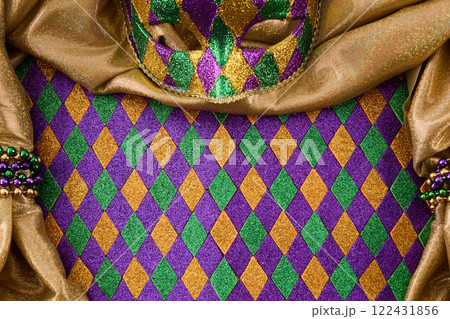 Colorful Mardi Gras Mask. A vibrant Mardi Gras arrangement 122431856