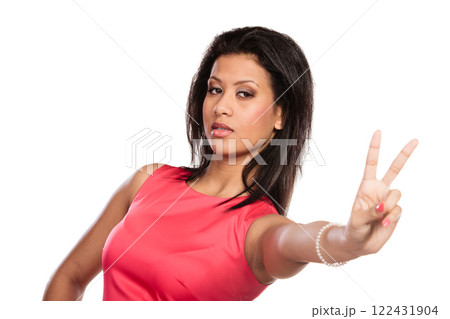 Mixed race woman girl giving peace v sign gesture. 122431904