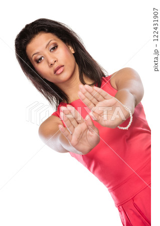 Mixed race woman showing stop sign gesture. 122431907