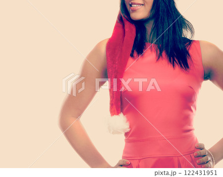 Woman mixed race santa helper hat portrait Woman mixed race santa helper hat portrait 122431951