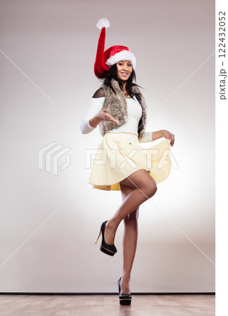 Fashion woman in santa helper hat Fashion woman in santa helper hat 122432052