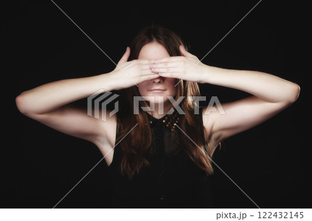 teen girl covering her eyes on black teen girl covering her eyes on black 122432145