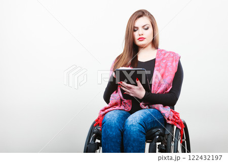 Disabled student with tablet ebook. Disabled student with tablet ebook. 122432197