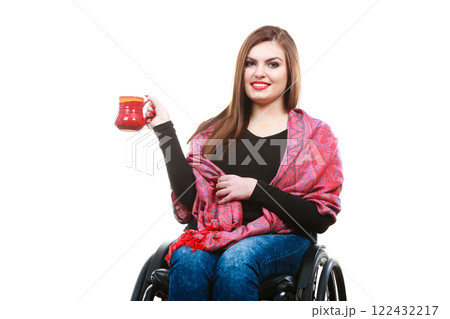 Cheerful crippled lady on wheelchair. Cheerful crippled lady on wheelchair. 122432217