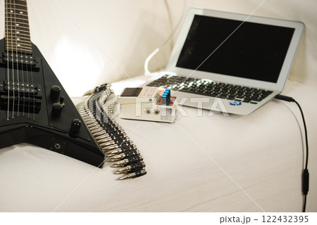 Electric guitar and laptop Electric guitar and laptop 122432395