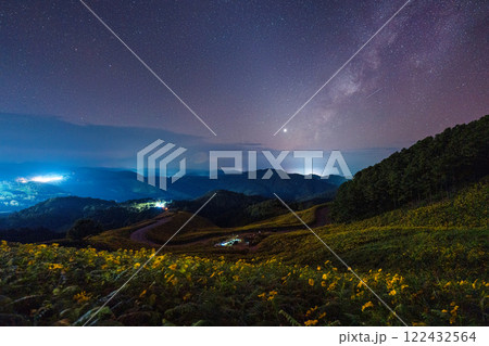 Landscape of Milky way over Tree Marigold field on hill in countryside at Doi Mae U Kho, Mae Hong Son 122432564