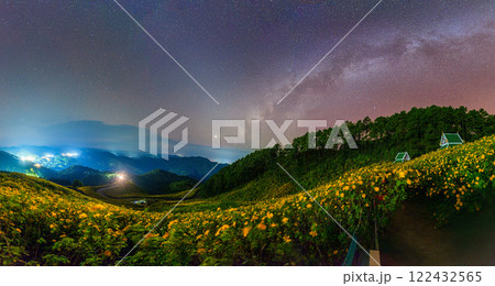 Milky way with starry over Tree Marigold field on hill in the night 122432565