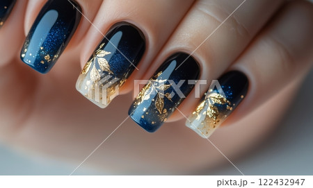 Close-up of Elegant Blue and Gold Nail Art 122432947
