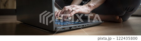 Female hands using laptop computer Female hands using laptop computer 122435800