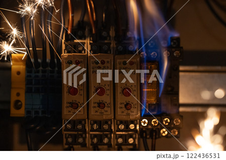 Electrical Panel with Sparks and Flames 122436531