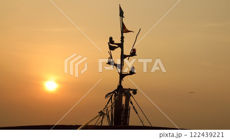 Boats in a Sunset in the sea Boats in a Sunset in the sea 122439221