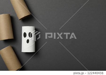 Paper rolls on gray background, space for text 122440438