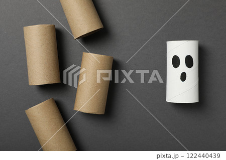 Paper rolls on gray background, top view Paper rolls on gray background, top view 122440439