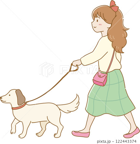 耳の垂れたペットの犬と散歩するリボンをつけた女の子 122443374