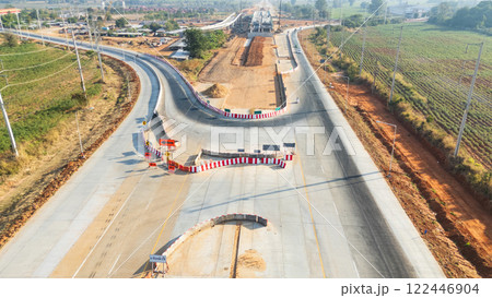 Drone shot aerial view of high angle view of a construction site building intersection across the bridge Drone shot aerial view of high angle view of a construction site building intersection across the bridge 122446904