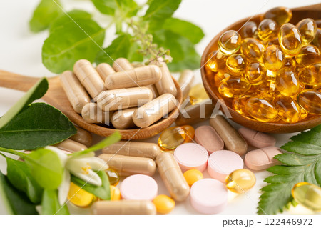 Alternative medicine herbal organic capsule, mineral, drug with herbs leaf natural supplements for healthy good life. Alternative medicine herbal organic capsule, mineral, drug with herbs leaf natural supplements for healthy good life. 122446972