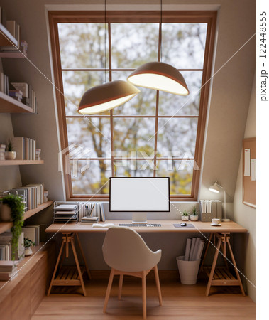 The interior of a contemporary, cozy beige home office features a computer on a wooden desk. The interior of a contemporary, cozy beige home office features a computer on a wooden desk. 122448555