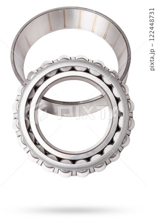 Shiny metal single row round roller bearing designed to absorb radial and one-sided axial loads of the vehicle. Sale of spare parts or repair in a workshop or car service. Shiny metal single row round roller bearing designed to absorb radial and one-sided axial loads of the vehicle. Sale of spare parts or repair in a workshop or car service. 122448731
