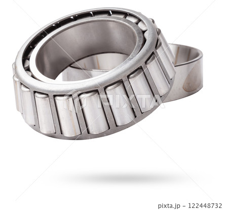 Shiny metal single row round roller bearing designed to absorb radial and one-sided axial loads of the vehicle. Sale of spare parts or repair in a workshop or car service. Shiny metal single row round roller bearing designed to absorb radial and one-sided axial loads of the vehicle. Sale of spare parts or repair in a workshop or car service. 122448732