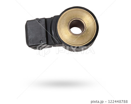 Knock sensor for vehicle engines spare parts electrical parts sensors on white background copy space Knock sensor for vehicle engines spare parts electrical parts sensors on white background copy space 122448788