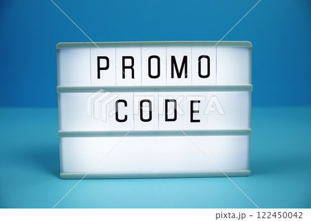 Promo Code letterboard text on LED Lightbox on blue background 122450042