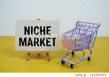 Niche Market text message and trolley shopping cart on yellow background Niche Market text message and trolley shopping cart on yellow background 122450914