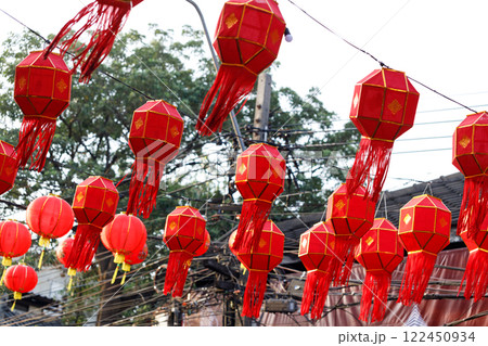 Spring festival, Lunar or Chinese new year lanterns decorated over street in old town, Thailand. The letters mean Luck, Congratulations, Blessing and Happiness 122450934