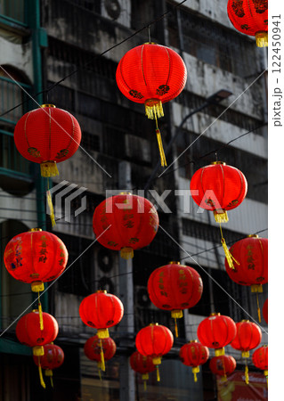 Spring festival, Lunar or Chinese new year lanterns decorated over street in old town, Thailand. The letters mean Luck, Congratulations, Blessing and Happiness Spring festival, Lunar or Chinese new year lanterns decorated over street in old town, Thailand. The letters mean Luck, Congratulations, Blessing and Happiness 122450941