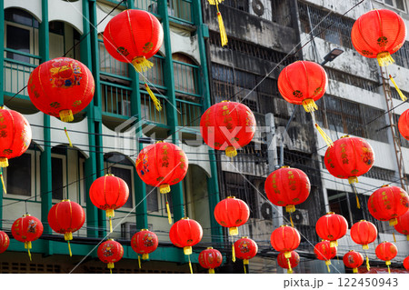 Spring festival, Lunar or Chinese new year lanterns decorated over street in old town, Thailand. The letters mean Luck, Congratulations, Blessing and Happiness Spring festival, Lunar or Chinese new year lanterns decorated over street in old town, Thailand. The letters mean Luck, Congratulations, Blessing and Happiness 122450943