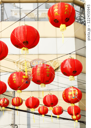 Spring festival, Lunar or Chinese new year lanterns decorated over street in old town, Thailand. The letters mean Luck, Congratulations, Blessing and Happiness Spring festival, Lunar or Chinese new year lanterns decorated over street in old town, Thailand. The letters mean Luck, Congratulations, Blessing and Happiness 122450945